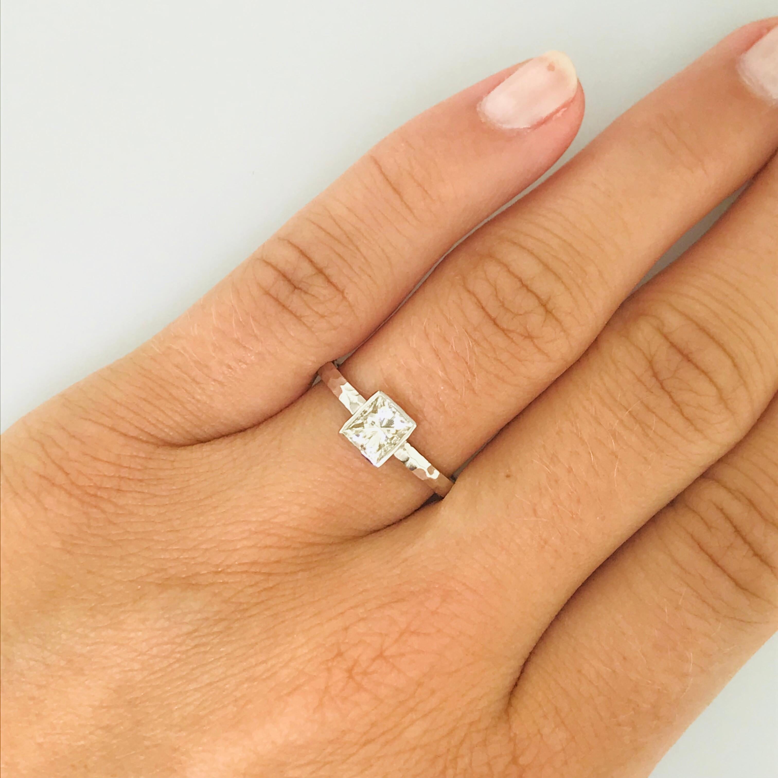 Down To Earth Natural Princess Diamond Engagement Ring

Five Star Jewelry in Austin, Texas has used 100% reclaimed materials to create this one of a kind fine jewelry piece. This NEW unique engagement ring holds a .72 carat princess (or square) cut