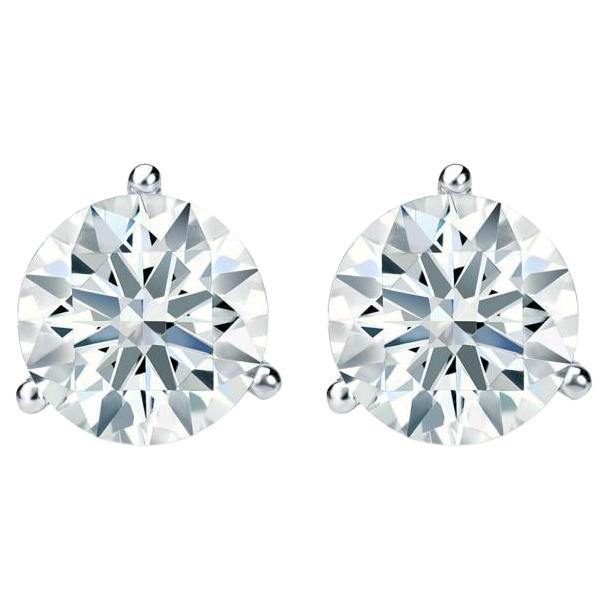 Clous d'oreilles à trois griffes en or blanc 14 carats avec diamants de 0,75 carat au total