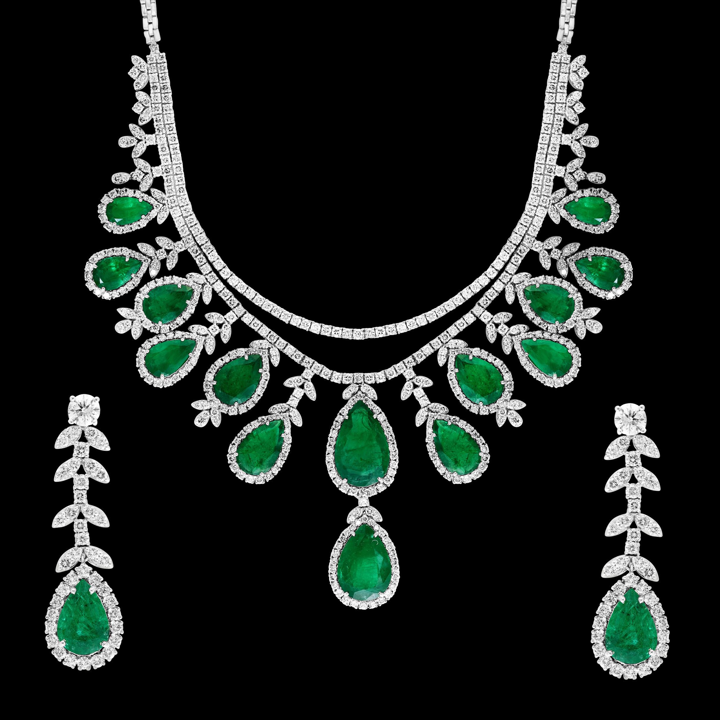  75 Ct  Zambian Emerald and 30 Ct Diamond Necklace and Earring Bridal Suite
Emeralds are Zambians.
23x14 larges pear shape 
19X13.5 next size which is a bottom drop 
16X10, 15X10 , 14X10 and smallest 12 X7
Total Ct weight 75 Cts
There are two layers