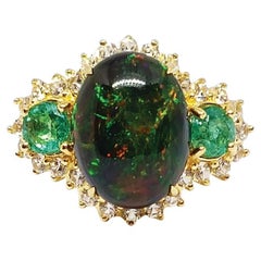 7.5 cts. Black Opal ring. Sterling Silver on 18K Gold Plated.