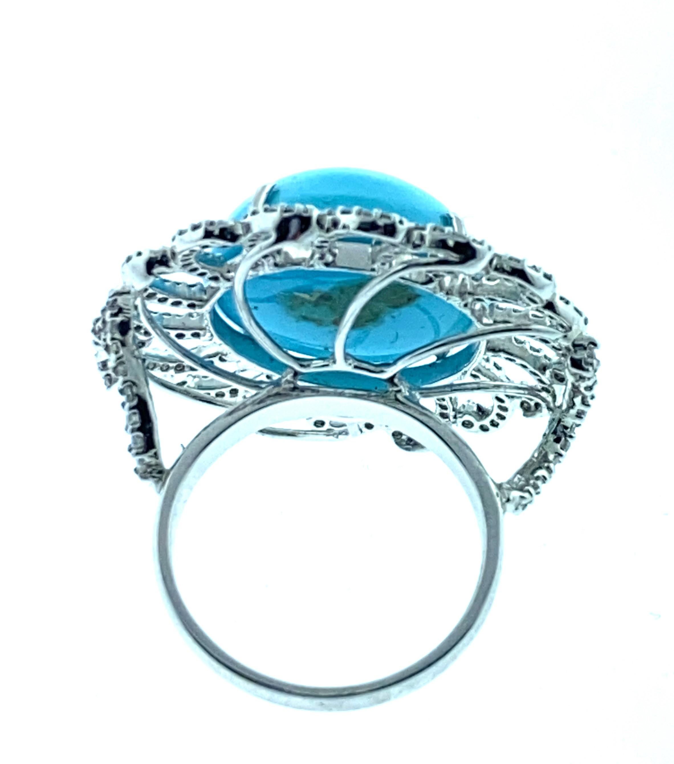 Round Cut 22.56 Carat Turquoise, 1.12 Carat Diamond Ring in 18 Karat White Gold For Sale