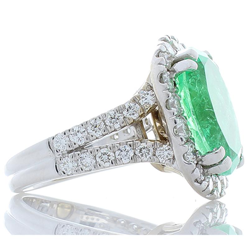 Contemporary 7.50 Carat Oval Cut Green Emerald and Diamond Cocktail Ring in 18 Karat Gold