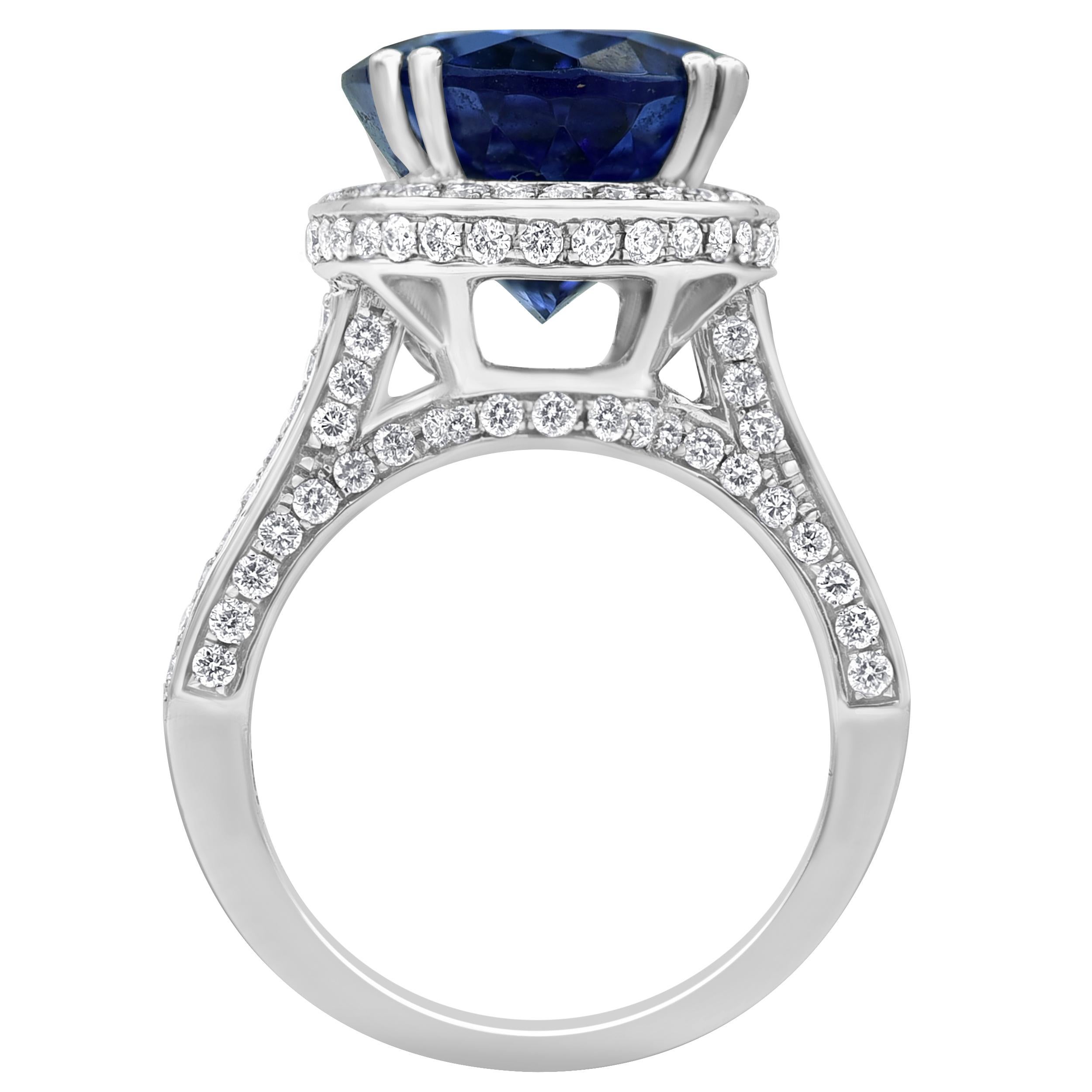 Oval Cut 7.50 Carat Oval Tanzanite and 0.90 Carat Diamond Frame Ring in 18K White Gold For Sale