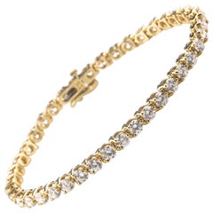 7.50 Carat Round Diamond 14 Karat Yellow Gold Tennis Bracelet