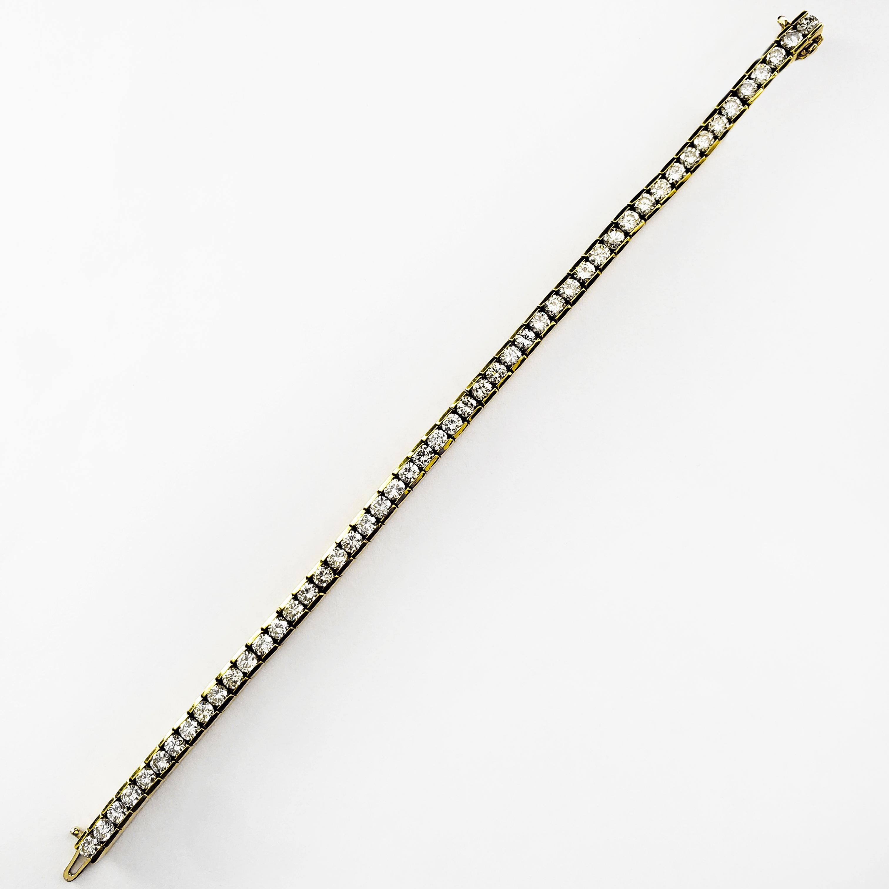 A classic tennis bracelet style showcasing 50 round brilliant diamonds weighing 7.50 carats total. Made with 18K Yellow Gold. 7 inches in Length.

Roman Malakov is a custom house, specializing in creating anything you can imagine. If you would like