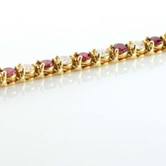7.50 Carat Ruby and Diamond 18 Karat Yellow Gold Line Tennis Bracelet