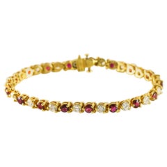 7.50 Carat Ruby and Diamond 18 Karat Yellow Gold Line Tennis Bracelet