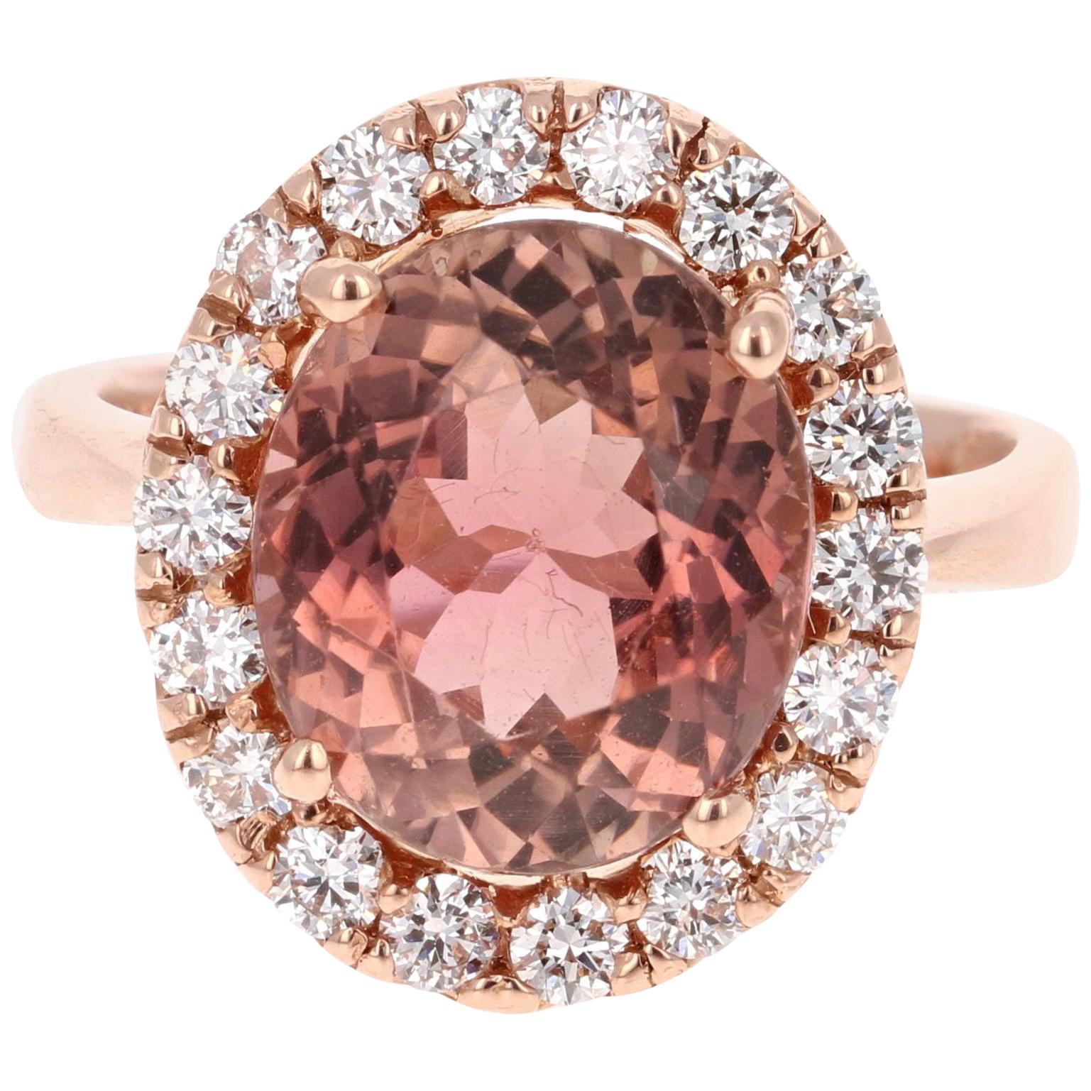 Super gorgeous 7.50 Carat Tourmaline and Diamond 14K Rose Gold Cocktail Ring!

This ring has a 6.43 carat Oval Cut Tourmaline that is set in the center of the ring and is surrounded by 18 Round Cut Diamonds that weigh 0.77 carats (Clarity: VS2,