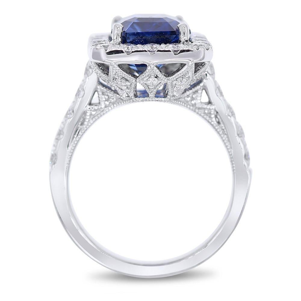 Royal blue Sapphire and Diamond ring

18K white gold ring with 5.76 Carats Sapphire in the center, Emerald cut, surrounded by 1.50 carats of diamonds. 

Diamond specifications:
G-H color, SI clarity

This product comes with a certificate of