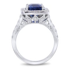 7.50 Carat Royal Blue Emerald Cut Sapphire Diamond Ring