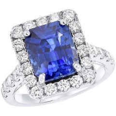 7.50 Carat Royal Blue Emerald Cut Sapphire Diamond Ring
