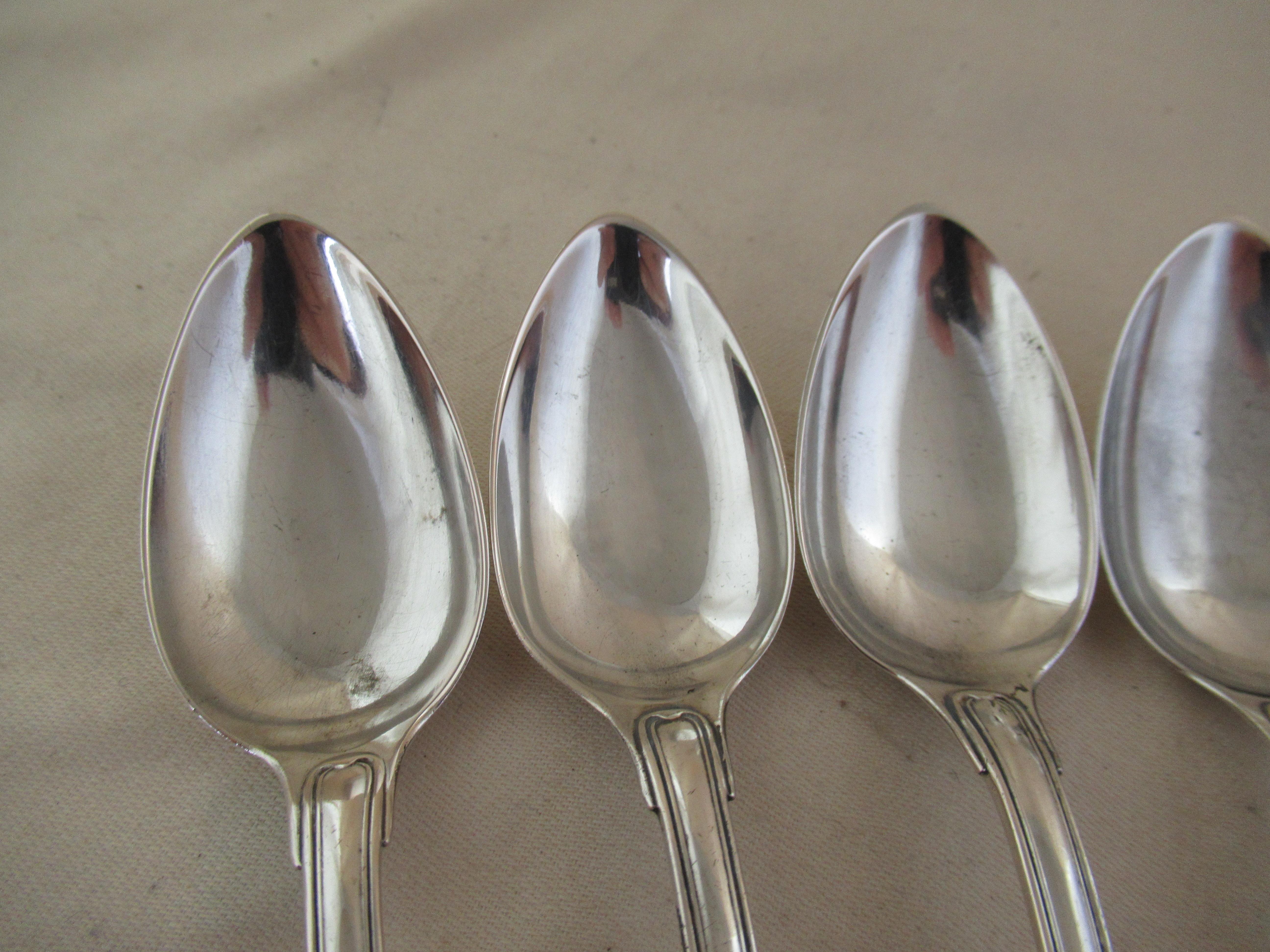 750 silver set of 6 fiddle & thread teaspoons
Quality mark on the back - 750. This means that the spoons are 75% silver and 25% other metal, probably nickel. Sterling silver is 92.5 % silver and 7.5% other metal. Since silver is a relatively soft