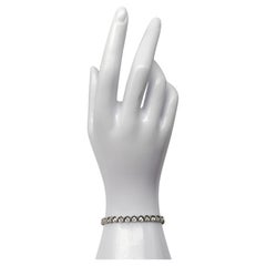 750 white gold tennis bracelet with diamonds