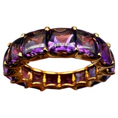 750 yellow gold ring with amethysts