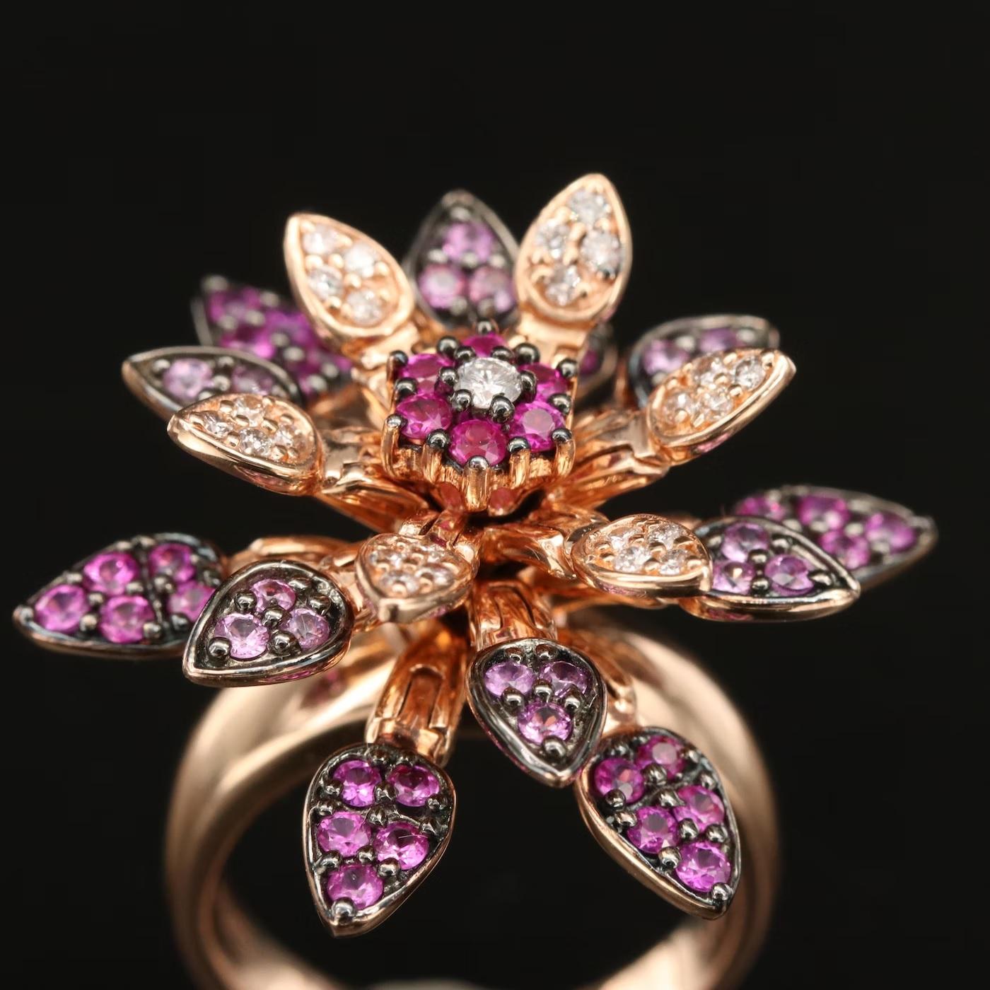 MADE IN THE USA

EFFY Designer ring, stamped and hallmarked EFFY

NEW WITH TAGS, Tag Price $7500

Amazing flower 3D design, mechanical ring, the flower pedals open and close and the flower turns 360 degrees

1.31 CWT diamond, Ruby and Pink Sapphire,