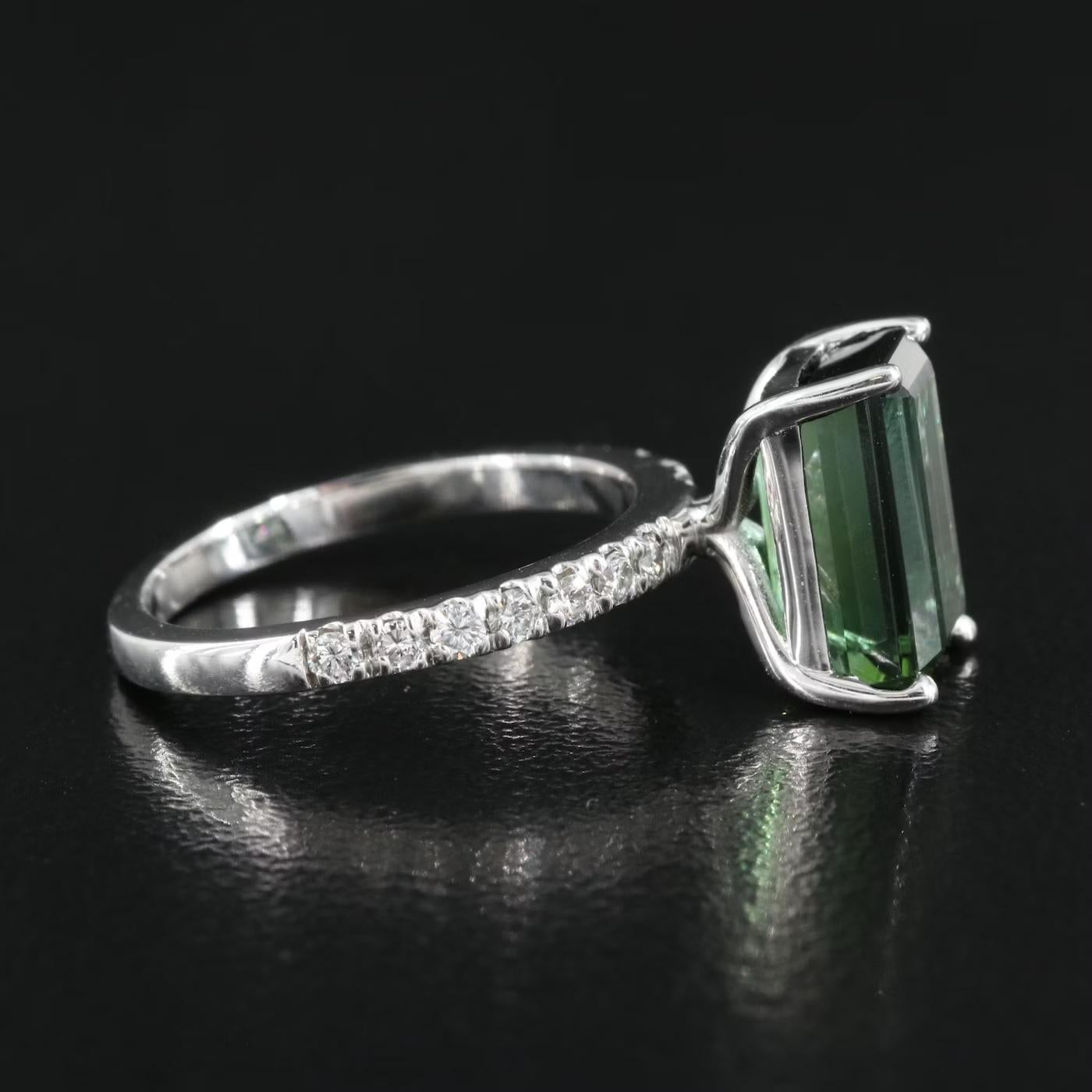 GIA certified, see attached GIA certificate

GIA Report #2223829139 Enclosed

NEW WITH TAGS, Tag Price $7500

GIA certified, 3.25 CT High quality Tourmaline 

0.28 CWT Diamond
         
14K white gold, stamped 14K

Head turner, statement piece.