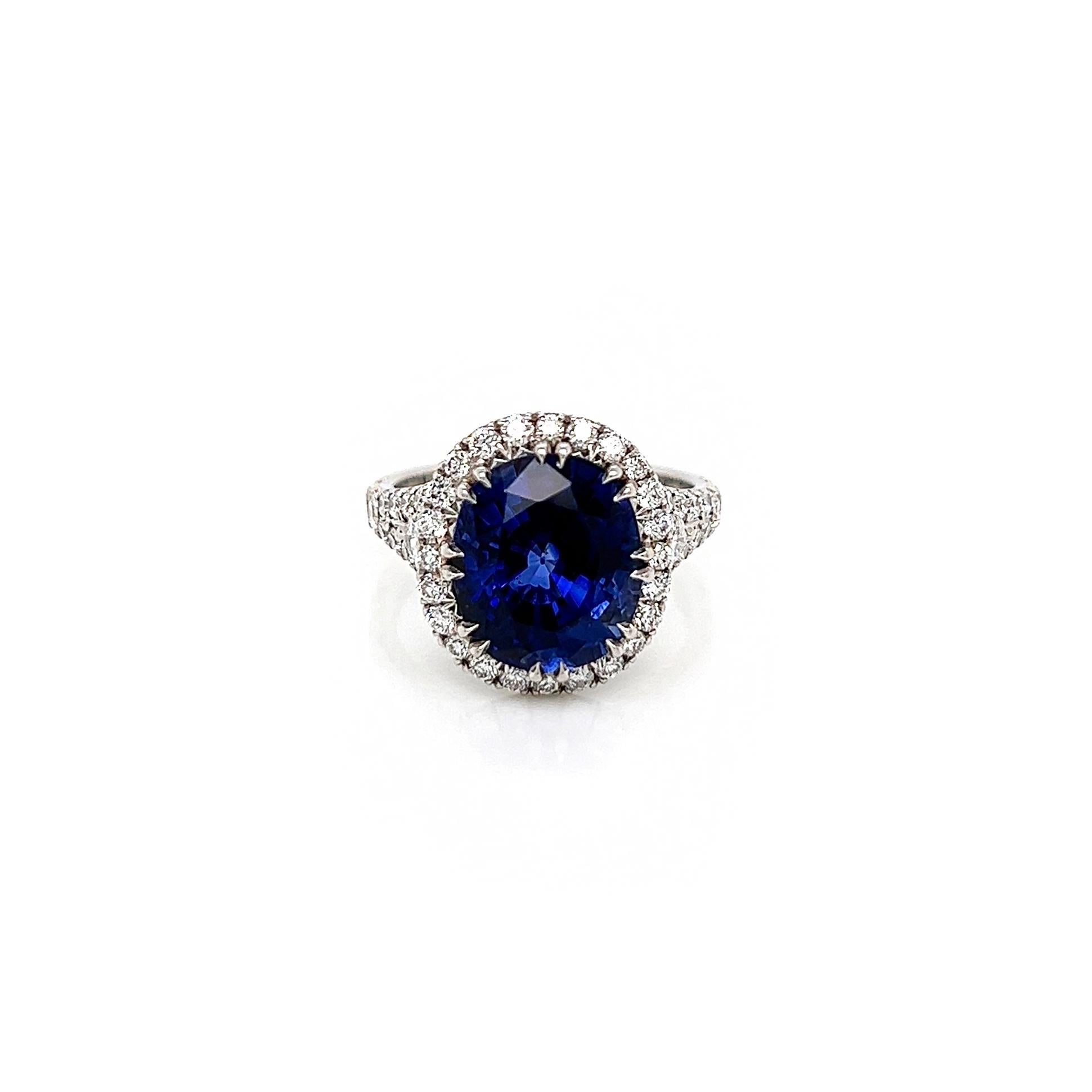 7.50 Total Carat Sapphire and Diamond Halo Pave-Set Ladies Ring. GIA Certified.

-Metal Type: Platinum
-6.49 Carat Oval Cut Natural Blue Sapphire, GIA Certified. Geographic origin - Madagascar
-Sapphire Measurements: 11.22 x 9.67 x 7.10 mm 
-1.01