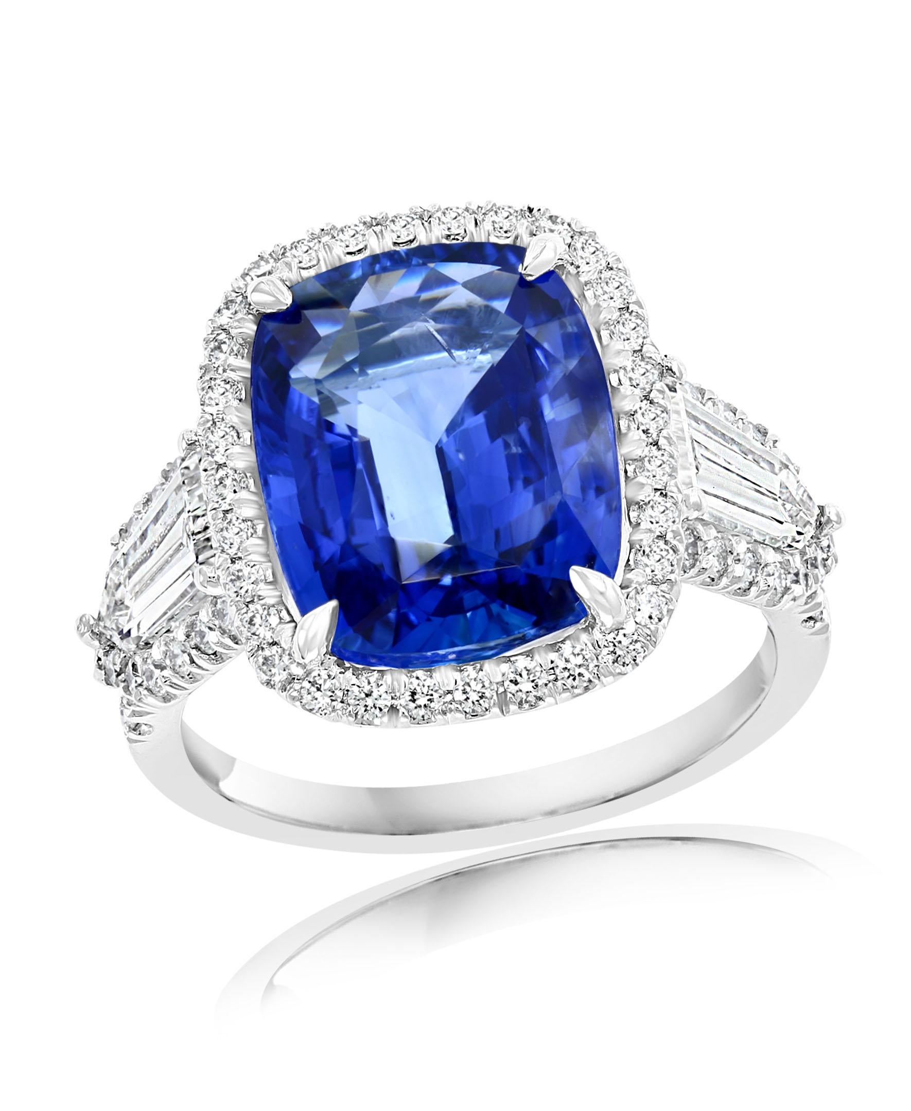 Features a beautiful and rare 7.51 cushion-cut blue sapphire. Flanking the center gemstone are 2 tapered baguette diamonds on either side weighing 1.01 carats. A single row of round brilliant diamonds accent the center and side stones. The total