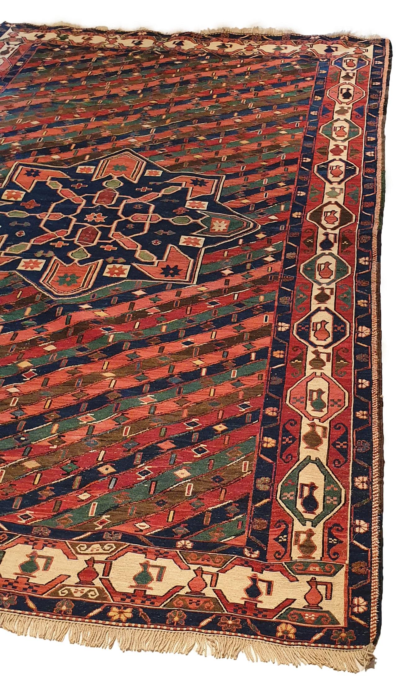 751 - Nice 20th century Kilim from Azerbaijan with beautiful pattern, and beautiful colors pink, orange, yellow, green and dark brown, entirely hand-woven with wool woven on cotton foundation.