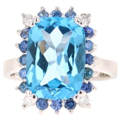 Anello in oro bianco 14 carati con topazio blu da 7,52 carati, zaffiro e diamanti