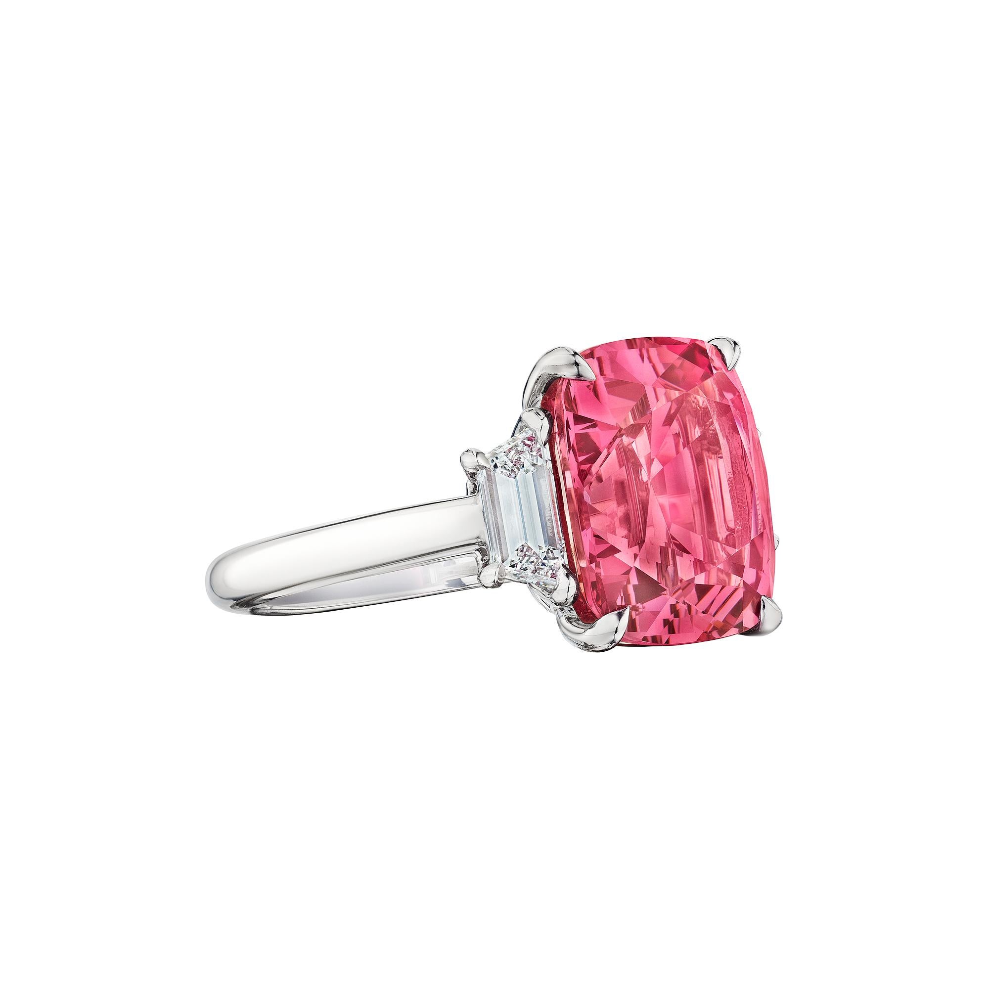 Everyone should have a cushion.  And you will, with this exquisite 7.53 carat cushion cut luscious light mauve pink natural, no heat, Burma spinel diamond platinum ring.  With two trapezoid cut side diamonds weighing a total of .70 carats, this