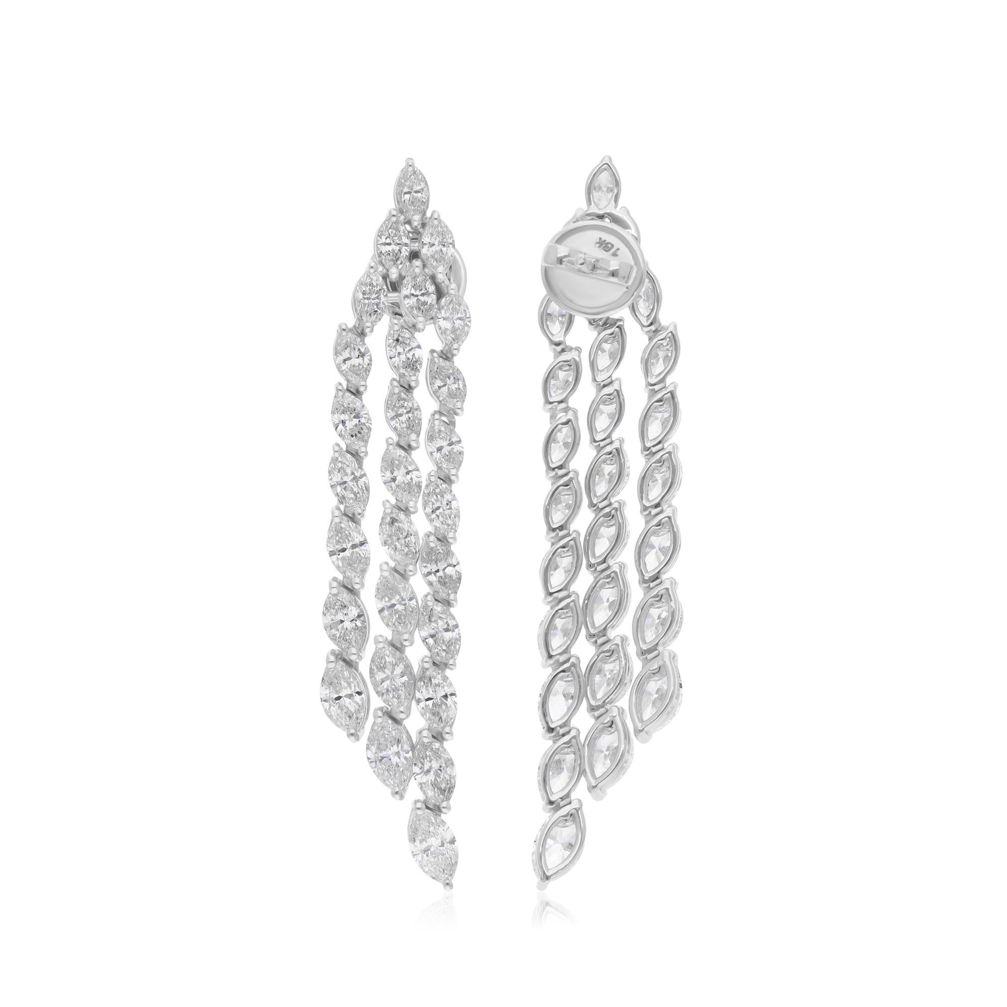 Élevez votre élégance avec ces superbes boucles d'oreilles chandelier, dotées d'un impressionnant total de 7,53 carats de diamants taillés en brillant. Réalisées en or blanc luxueux 14 carats, ces boucles d'oreilles allient sophistication