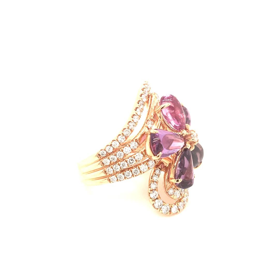 18 KT rose gold ring set with 7.53 Carats of cabochon pink sapphire
and 1.27 carats of round cut Diamonds color G clarity VS
the cabochon sapphires gives to the ring a very nice volume
finger size 14 Italian size  made in Italy comes in a Box
