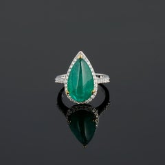 7.54 Carat Pear Shape Emerald Cabochon and Diamond Ring