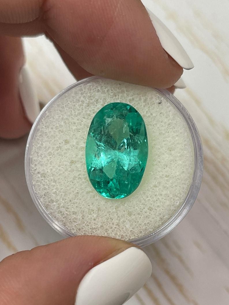 Modern 7.55 Carat Bluish Green Colombian Emerald Oval Cut - May Birthstone Gem For Sale