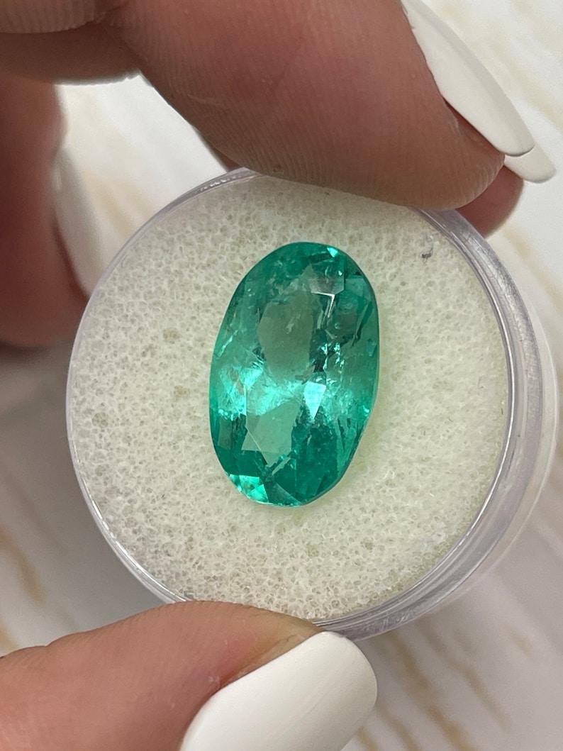 7.55 Carat Bluish Green Colombian Emerald Oval Cut - May Birthstone Gem In New Condition For Sale In Jupiter, FL