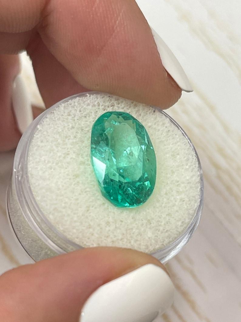7.55 Carat Bluish Green Colombian Emerald Oval Cut - May Birthstone Gem For Sale 1