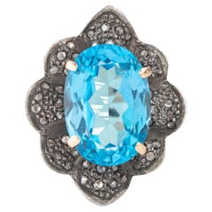 Anillo solitario de diamantes y topacio azul de 7,55 quilates