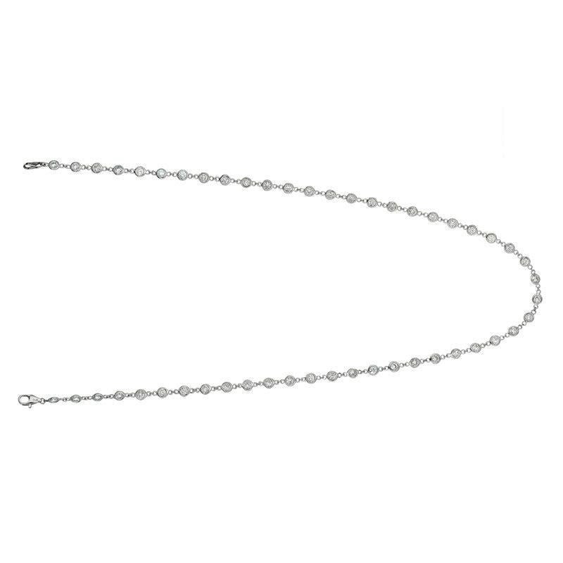 7.55 Carat Diamond by the Yard Necklace G SI 14K White Gold 18 inches

100% Natural Diamonds, Not Enhanced in any way Round Cut Diamond by the Yard Necklace  
7.55CT
G-H 
SI  
14K White Gold, Bezel style, 11.20 gram
18 inches in length, 3/16 in