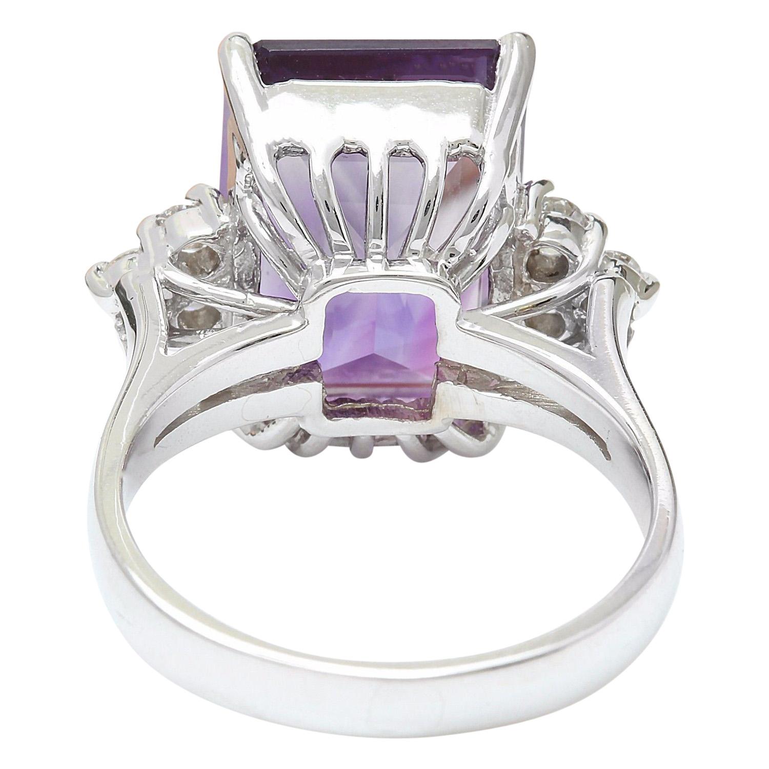 white gold ring with purple stone