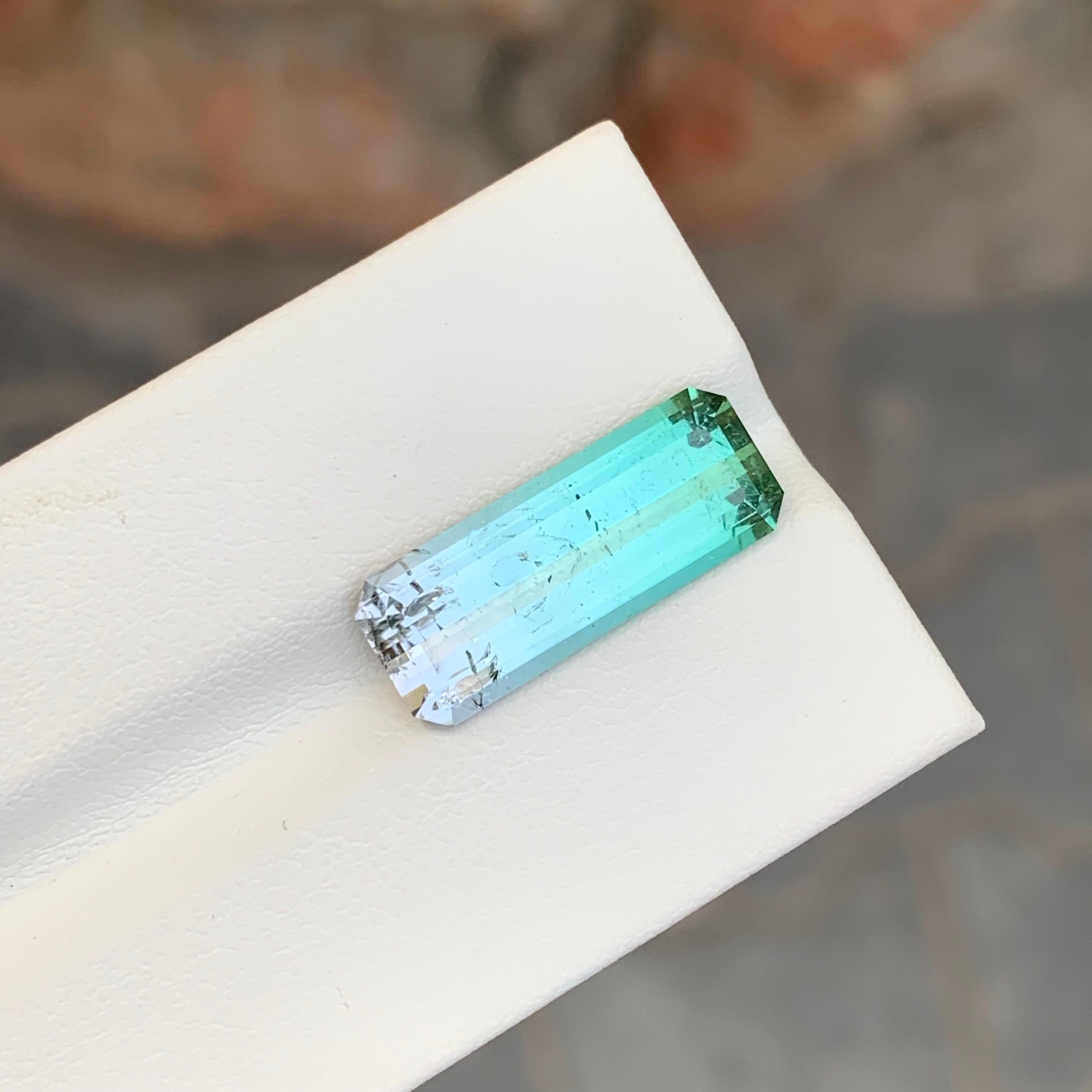 Arts and Crafts 7.55 Carat Natural Loose Bi Colour Tourmaline Long Emerald Shape Gemstone For Sale