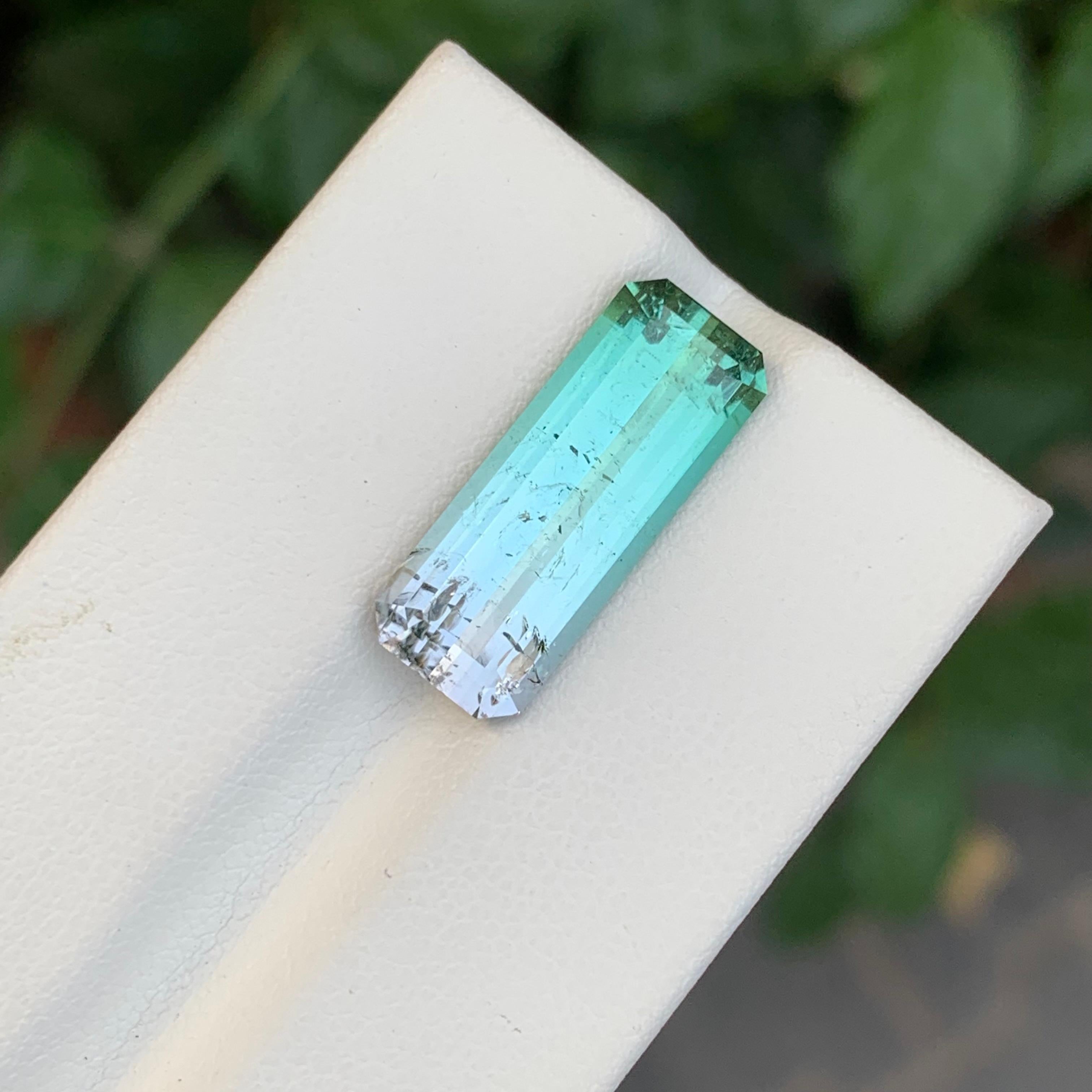Women's or Men's 7.55 Carat Natural Loose Bi Colour Tourmaline Long Emerald Shape Gemstone For Sale