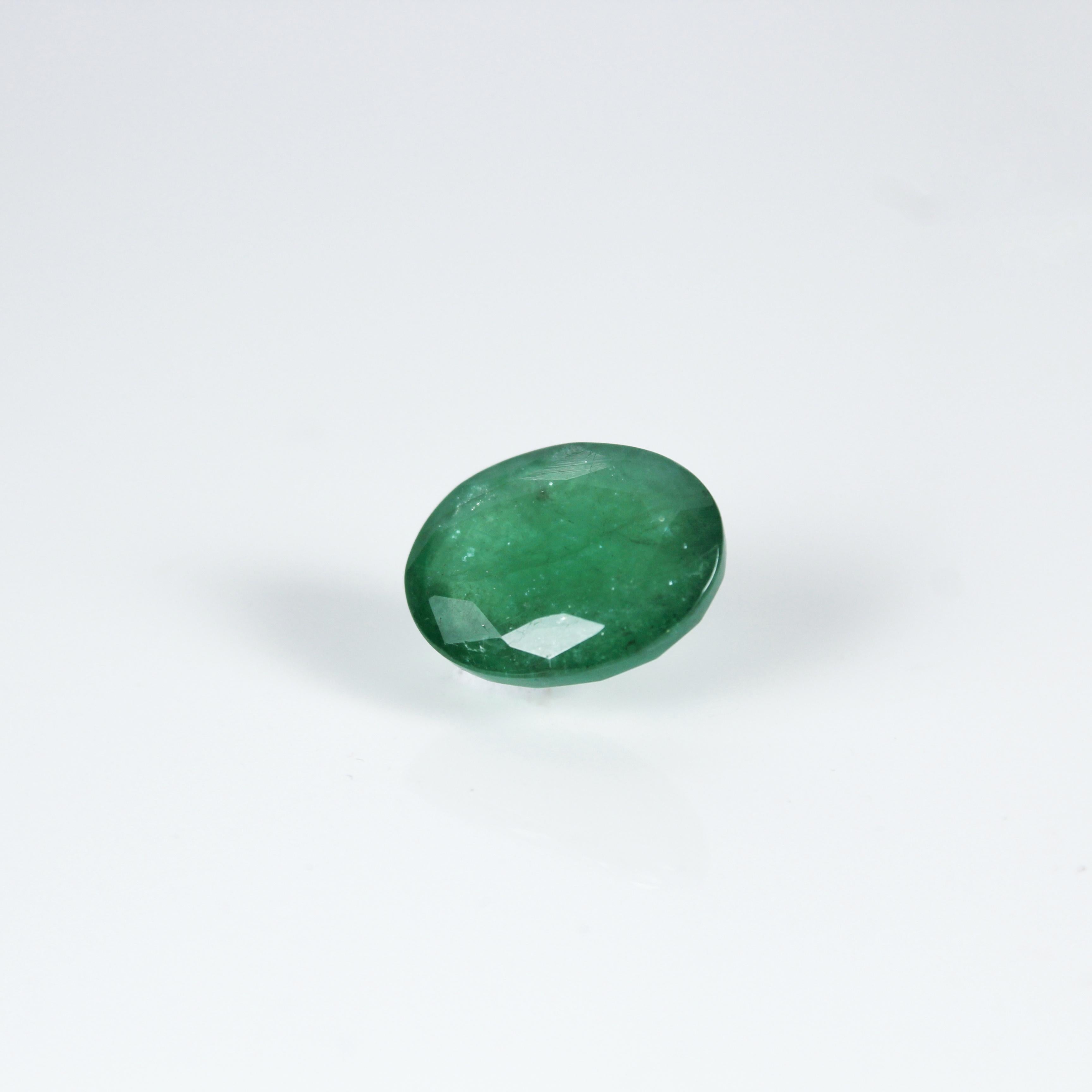 Product Details:

- Species: Natural Beryl
- Variety: Emerald
- Dimensions: 14 x 11 x 4 mm
- Shape / Cut: Oval
- Weight: 7.55
- Clarity: Semi - Transparent
- Color: Dark Green

This beautiful natural emerald is perfect for making ring or delicate