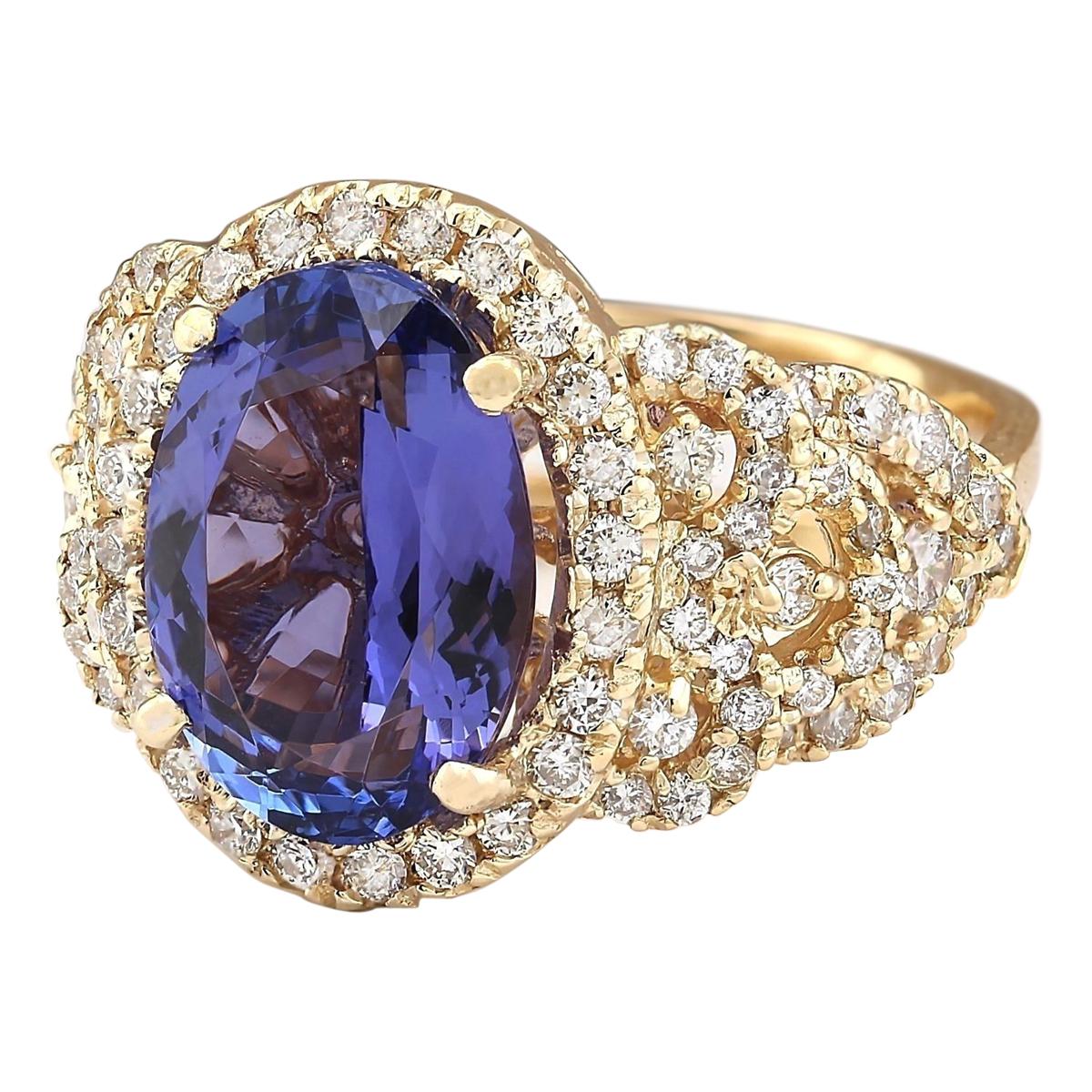 Introducing our exquisite 14 Karat Yellow Gold Diamond Ring, featuring a captivating 7.55 Carat Tanzanite centerpiece, stamped for authenticity. Crafted with precision and elegance, this ring exudes luxury and sophistication. Weighing 10.4 grams, it