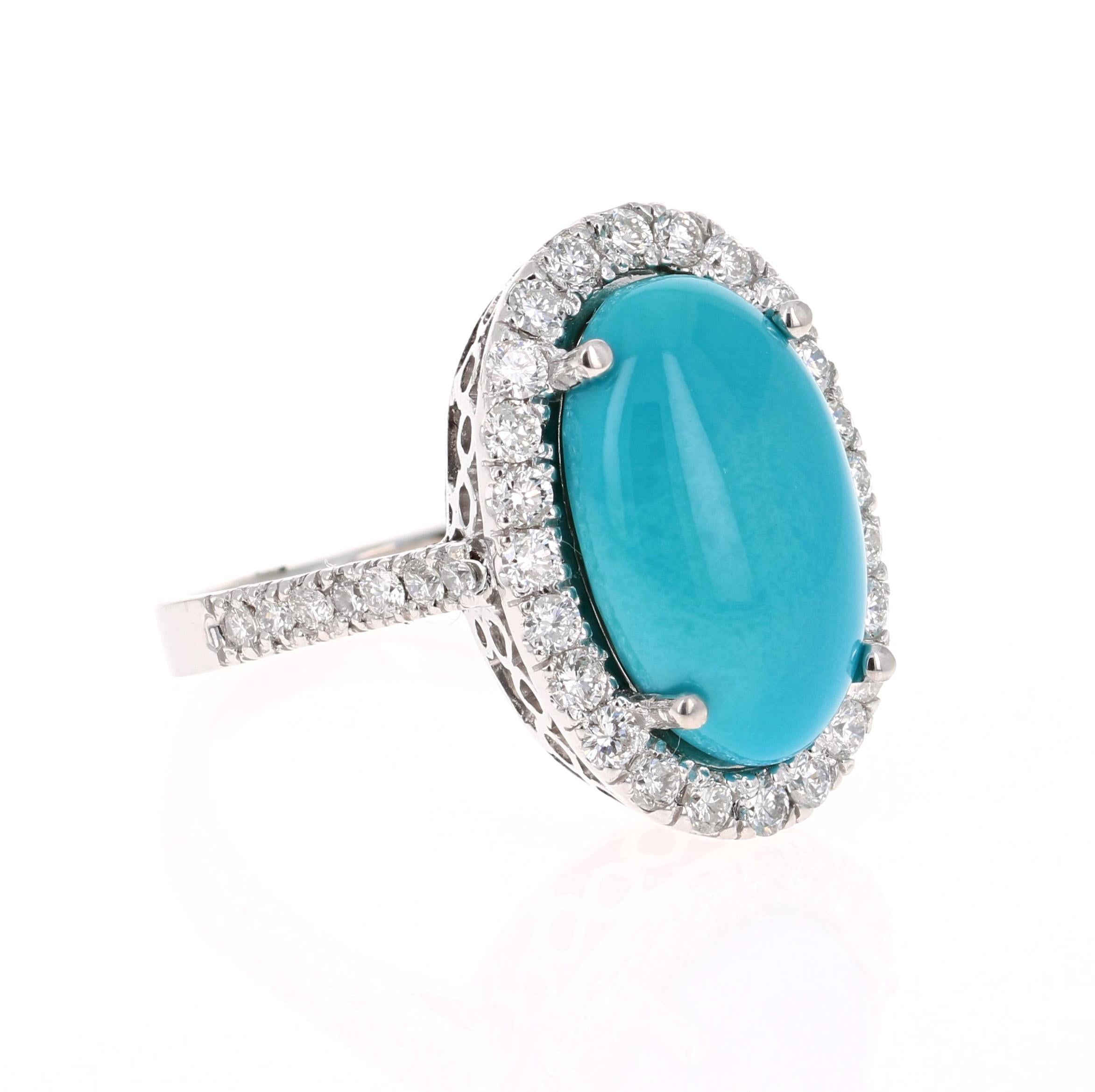 This is an exceptional and unique beauty! 

The Oval Cut Turquoise is 6.56 Carats and is surrounded by a beautiful halo of 38 Round Cut Diamonds that weighs 0.99 Carats. The clarity and color of SI-F. The total carat weight of the ring is 7.55
