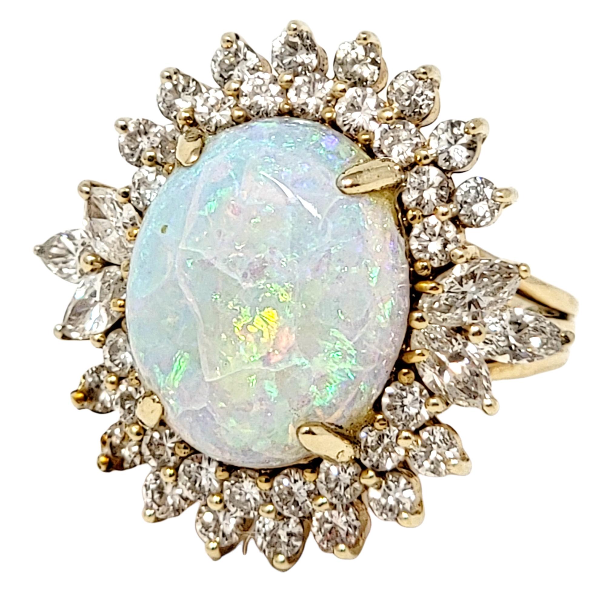 Ring size: 5.75

Spectacular, eye-catching opal and diamond halo cocktail ring will light up your finger! The stunning main stone has a gorgeous play-of-color, showing iridescent shades of purple and green within the white opal, while the icy