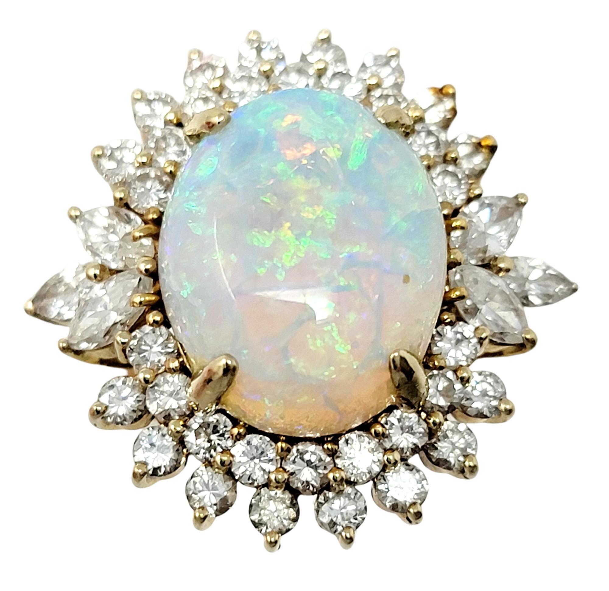 Contemporary 7.55 Carats Total Opal Cabochon and Diamond Halo Ring in 14 Karat Yellow Gold For Sale