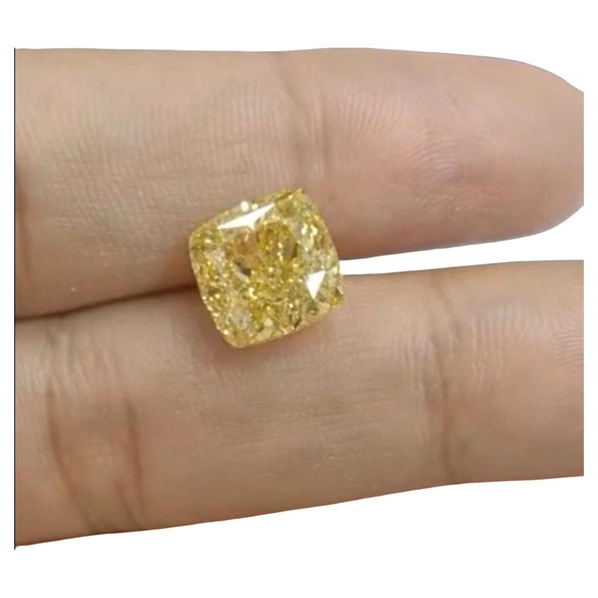 Fantastic 7.55 Carat Natural Diamond Cushion Shape.
Certified by the GIA as Fancy Vivid Yellow is a fantastic investment grade diamond of 7.55 Carat weight internally flawless in clarity excellent polish, excellent simmetry and none fluorescence.