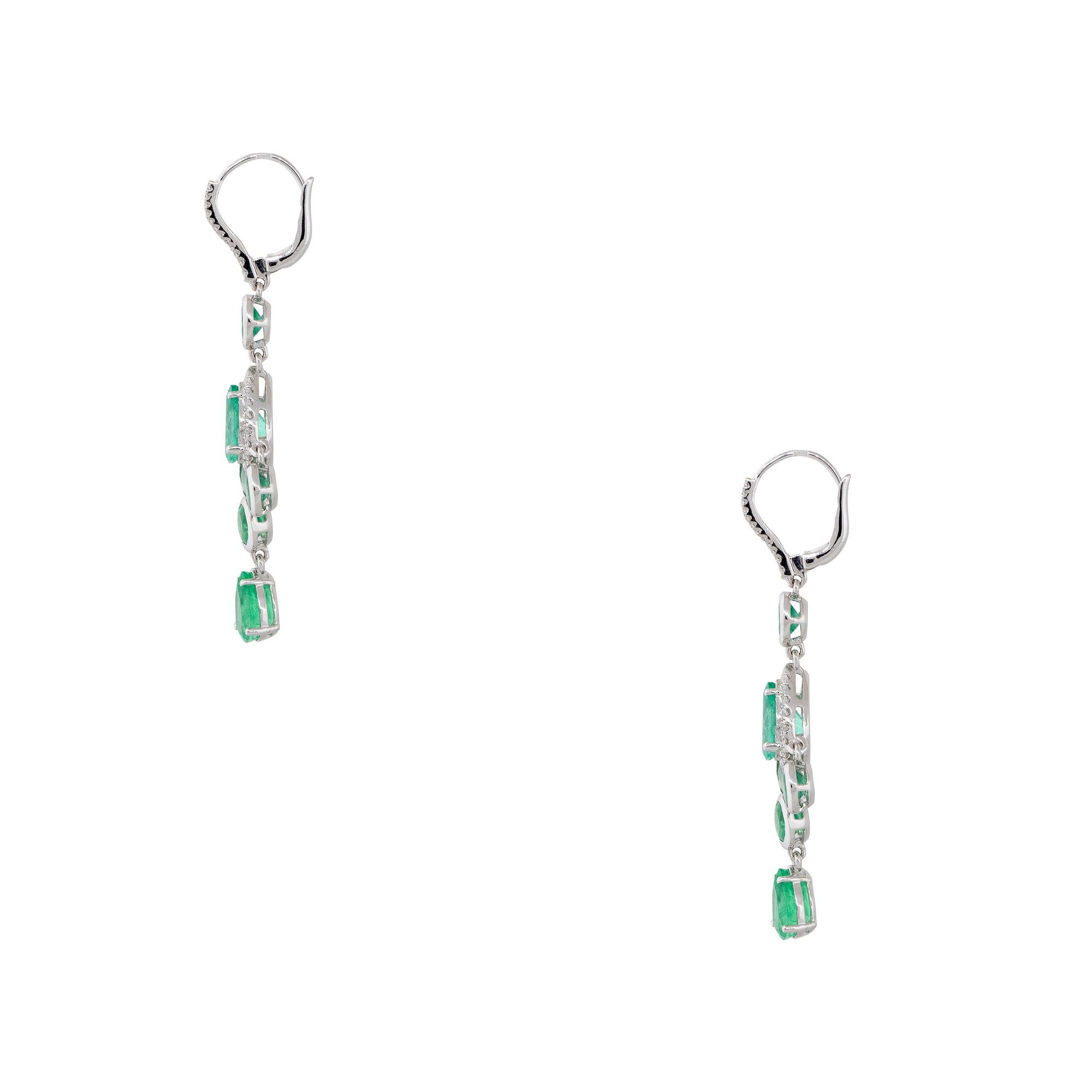7.56 Carat Emerald and Diamond Halo Drop Earrings 18 Karat In Stock In Excellent Condition For Sale In Boca Raton, FL