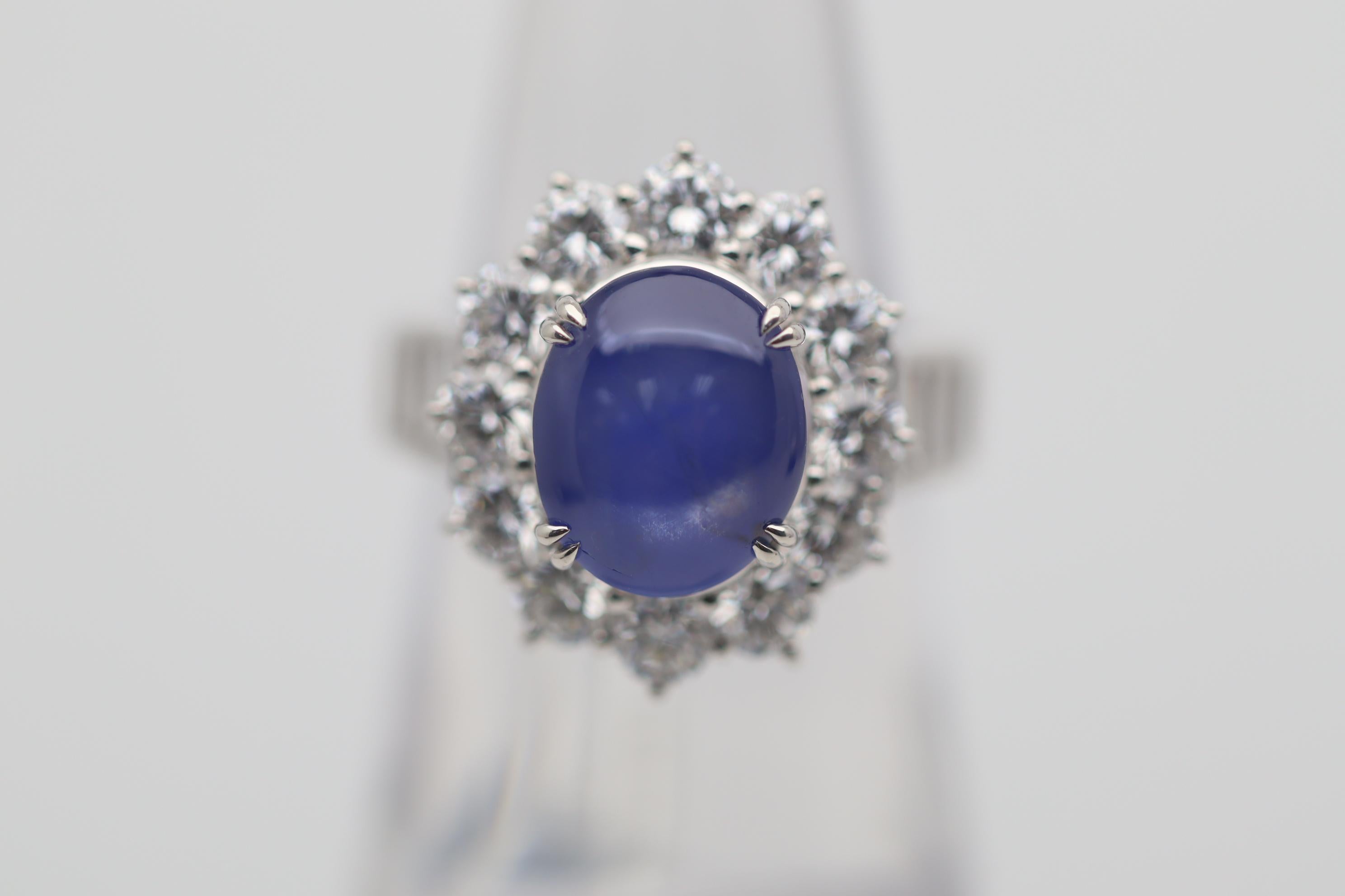 A chic, elegant, and very fine quality natural star sapphire takes center stage. It weighs an impressive 7.56 carats and has rich pure blue color rarely seen in star sapphires. Adding to that, the stone is untreated and unheated, and has a strong
