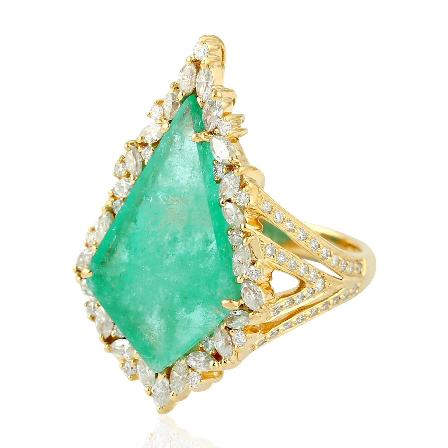 This stunning ring has been meticulously crafted from 14-karat gold. It is hand set in 7.57 carats emerald and illuminated with 1.35 carats of glittering diamonds. 

The ring is a size 7 and may be resized to larger or smaller upon request. 
FOLLOW 