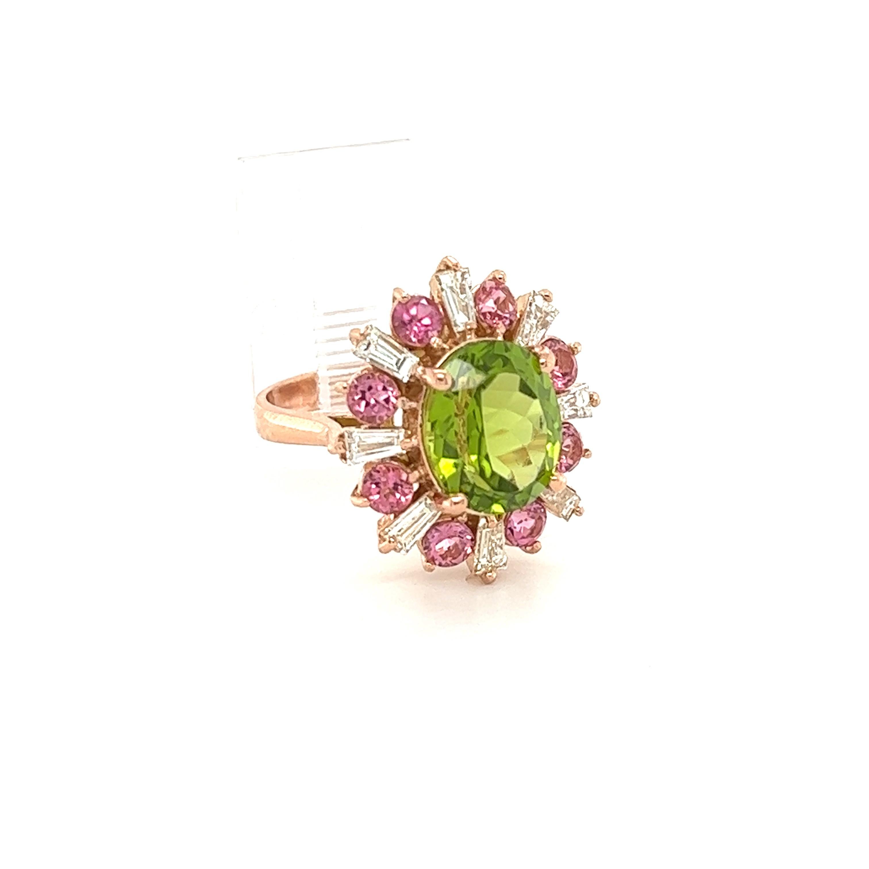 This ring has a beautiful Natural Oval Cut Peridot that weighs 5.41 Carats. The Peridot measures at 
It also has 8 Round Cut Natural Tourmalines that weigh 1.33 Carats as well as 8 Baguette Cut Diamonds that weigh 0.83 Carats. (Clarity: VS, Color: