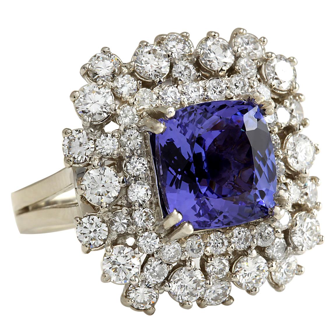 Elevate your style with this captivating Tanzanite and Diamond Ring, crafted in luxurious 14K white gold. The centerpiece is a mesmerizing 7.57 carat Tanzanite, exuding rich hues and measuring 9.50x9.50 mm. Surrounding it are dazzling diamonds