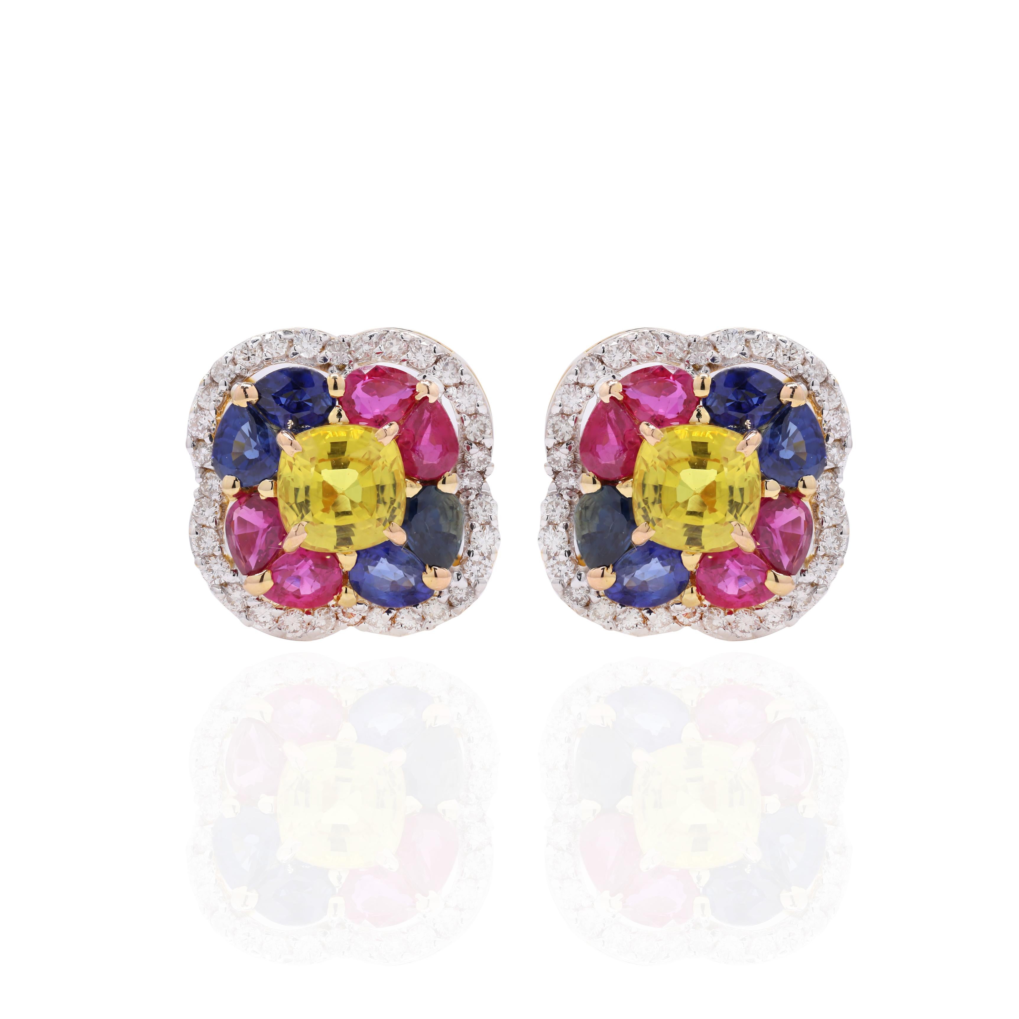 Earrings create a subtle beauty while showcasing the colors of the natural precious gemstones and illuminating diamonds making a statement.
Pear and cushion cut multi sapphire studs with diamonds in 18K gold. Embrace your look with these stunning