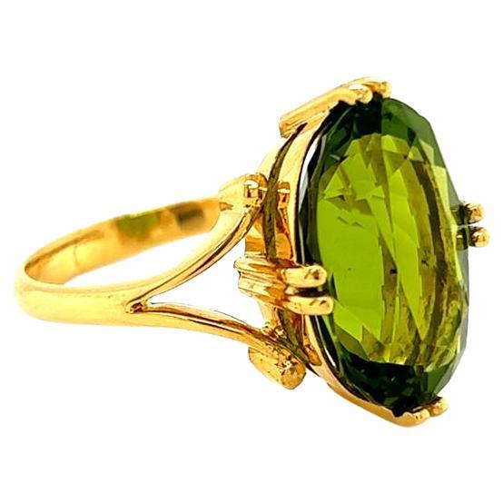 7.58 Carat Oval Peridot Handcrafted Solitaire Ring in 18 Karat Yellow Gold For Sale