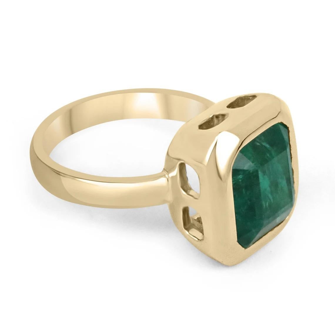 Displayed is a magnificent solitaire emerald engagement or right-hand ring. This lovely piece showcases an impressive 7.58-carat, natural emerald from the origin of Zambia. This mesmerizing stone has the most beautiful and desirable dark forest